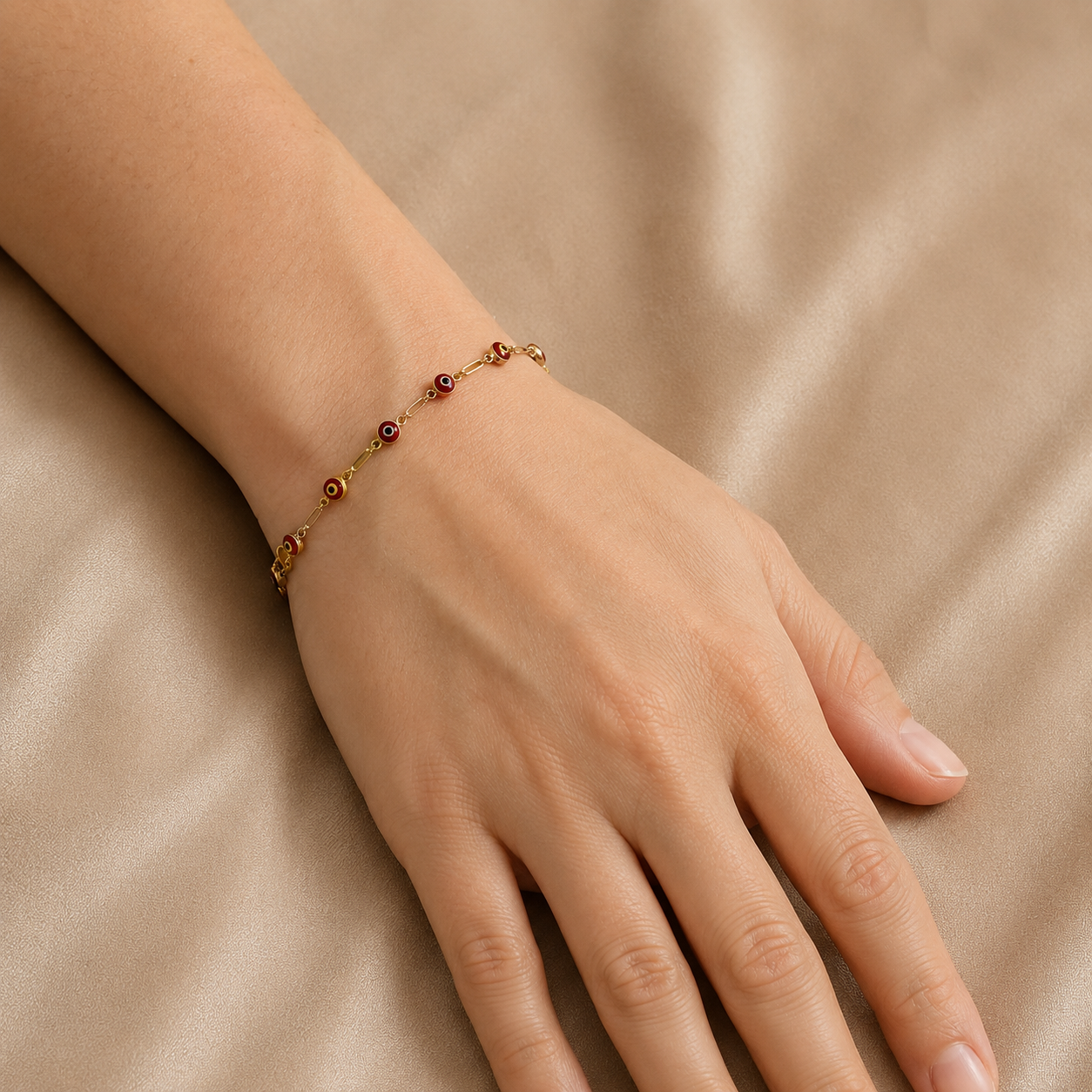 PULSERA TEJIDO PAPER CLIP C/ OJOS TURCOS