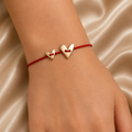 RED THREAD BRACELET WITH HEARTS