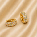 SPACER WITH ZIRCONS